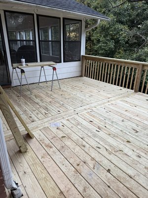 Deck repair in Knoxville 2025 - This was a nightmare. The customer wanted to save the existing framework so we made a few minor adjustments to the framework. There was way too much weight on that ledger board connected to the house so if anything ever fell in the deck, you would pull half the house with it. So we put a T brace with six by sixes under the deck. We also put some tea braces under the sunroom area because it had the same problem. The deck had way too much weight on the house and not enough post support and their concrete stairway that was connected to their house had exterior posts that were very small and rusting at the bottom and also hollow. So we filled the posts with cement and then wrapped rebar around them and poured concrete. Deck repair in Knoxville 2025 - This was a nightmare. The customer wanted to save the existing framework so we made a few minor adjustments to the framework. There was way too much weight on that ledger board connected to the house so if anything ever fell in the deck, you would pull half the house with it. So we put a T brace with six by sixes under the deck. We also put some tea braces under the sunroom area because it had the same problem. The deck had way too much weight on the house and not enough post support and their concrete stairway that was connected to their house had exterior posts that were very small and rusting at the bottom and also hollow. So we filled the posts with cement and then wrapped rebar around them and poured concrete.