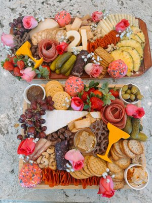 21st Birthday Board - Our 21st birthday charcuterie board was an absolute hit! 🎉✨ Filled with an assortment of gourmet cheeses, artisanal cured meats, fresh fruits, and delectable treats, this board was designed to impress. We added a touch of fun with personalized details to make the celebration extra special. It was the perfect centerpiece for the party, sparking conversation and bringing everyone together. Guests couldn't get enough of the delicious variety, and the birthday girl was thrilled with the stunning spread. It’s no wonder this board was the highlight of the night! 21st Birthday Board - Our 21st birthday charcuterie board was an absolute hit! 🎉✨ Filled with an assortment of gourmet cheeses, artisanal cured meats, fresh fruits, and delectable treats, this board was designed to impress. We added a touch of fun with personalized details to make the celebration extra special. It was the perfect centerpiece for the party, sparking conversation and bringing everyone together. Guests couldn't get enough of the delicious variety, and the birthday girl was thrilled with the stunning spread. It’s no wonder this board was the highlight of the night!