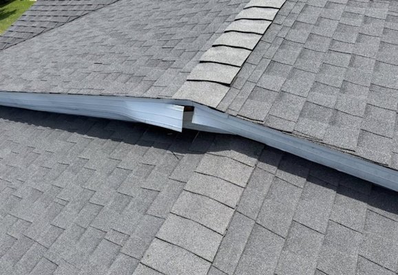 🏘️ Expert Roof & Ridge Vent Repair - We restored this roof’s integrity by repairing and straightening damaged ridge vent flashing—eliminating potential leaks and protecting the entire property. Our team finished with professional shingle work to deliver a polished, weather-tight result that enhances both durability and appearance. Count on Ultimate Exteriors for quality roof repairs that last! 🏘️ Expert Roof & Ridge Vent Repair - We restored this roof’s integrity by repairing and straightening damaged ridge vent flashing—eliminating potential leaks and protecting the entire property. Our team finished with professional shingle work to deliver a polished, weather-tight result that enhances both durability and appearance. Count on Ultimate Exteriors for quality roof repairs that last!