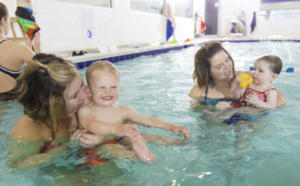Infants and Toddlers - Children are born with a natural affinity for the water. The sooner they are started back in the water, the quicker they learn and the less likely it is that they will grow afraid of it. This program is designed for children from ages 3 months through 3 years old and will allow you and your child to take the first steps towards a lifetime of swimming proficiency, together. That’s right….you join your child in the water! Each half hour session is supervised by a specially trained instructor who will lead you through a series of exercises and activities that will be fun and instructive for your child. The weekly routine that we observe teaches kids their primary skills of buoyancy, propulsion and breath control.

And, while developing these fundamental skills….your child is getting to spend quality time with you! In fact some psychologists suggest that the half hour of undivided attention and skin to skin contact that this program offers, has many benefits in the parent/child relationship.

KIDS FIRST® has trained more infants and toddlers over the past 15 years than any school in Mid-Atlantic region with over 100,000 families passing through our programs. Start your little one towards a lifetime of swimming proficiency today!