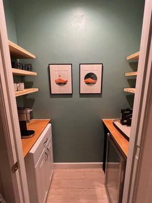 Floating Shelf Installation - Hung floating shelves and photos in a coffee/wine bar closet at a local Airbnb.
