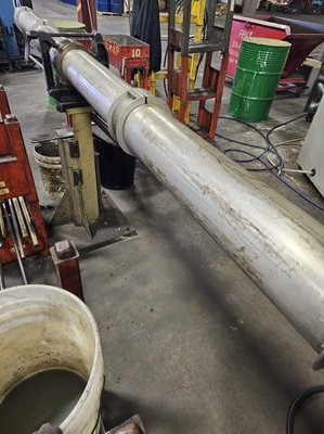 Deep cleaning of a bar feeder in a CNC Machine factory - Deep clean of a bar feeder.