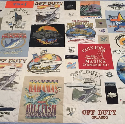 T-Shirt Quilts & Pillows - We specialize in custom T-Shirt Quilts!

Every quilt is made to order and  personalized  with an embroidered dedication label.