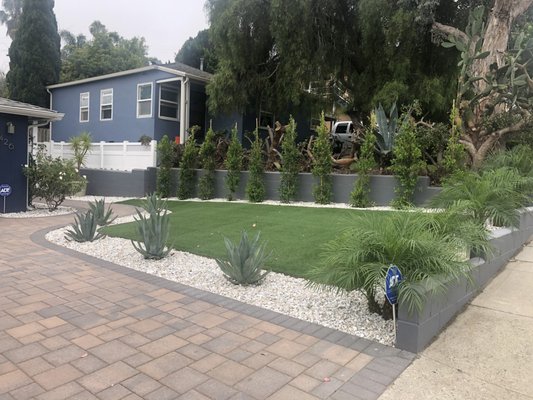 Front yard - This customer was asking for energy efficient front yard since he spend a lot of water on the grass and trees. now with desert plants not much water needed.