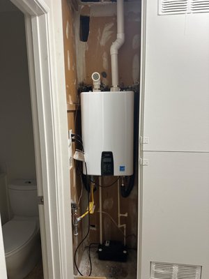 Tankless conversion 2025 - 2025 Tankless Conversion in Pleasant Hill. We upgraded this home from a traditional storage tank to a modern **tankless water heater installed inside a closet**, providing reliable hot water on demand, improved efficiency, and a clean, space-saving setup.