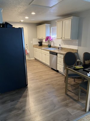 Kitchen remodel - 'This remodel was done on an old kitchen that was in bad shape. The rest of the house had been updated, so the kitchen stuck out like a sore thumb. We gutted it ar put in new cabinets and appliances to match the overa tone of the house and even added in a custom backsplash to give it some character. The owner absolutely loves cooking there now!"