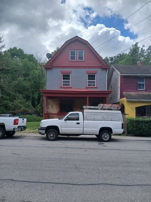 exterior painting - scraped all wood trim down replaced bad wood and repairs with fiberglass bondo prime 2 coats of paint brick got prime and 2 coats of paint as well