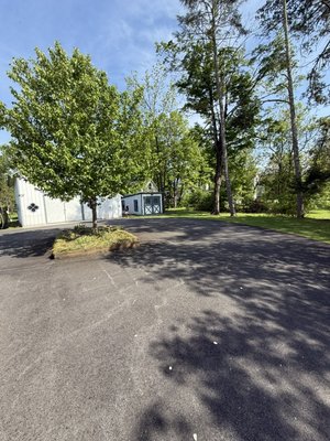 New driveway sealer - We cleaned down old driveway and applied a new sealer to asphalt. New driveway sealer - We cleaned down old driveway and applied a new sealer to asphalt.