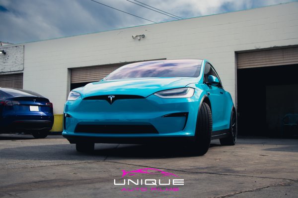 2023 Model X Miami-blue PPF Wrap - FULL BODY STEK PPF✅
CERAMIC PRO SILVER✅
CERAMIC WINDOWS TINT ✅
CALIPER COLOR CHANGE ✅

Protected and with a new Glossy Miami-blue PPF look! Model X is ready to keep cool the rest of summer and go on long road trips! Want to change the look of your vehicle? Request a Quote Today