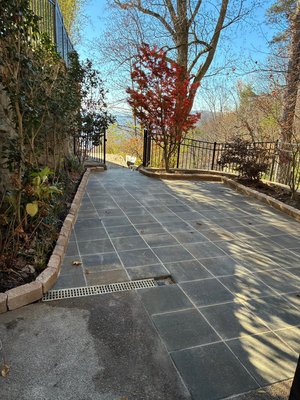 Residential patio 2025 - The project turned a high-maintenance dirt patch into a usable, low-maintenance outdoor living space that complements the existing elevated deck and scenic view. Residential patio 2025 - The project turned a high-maintenance dirt patch into a usable, low-maintenance outdoor living space that complements the existing elevated deck and scenic view.