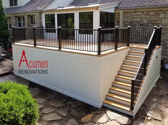 Four Season Room & Zuri Deck Installation – Olathe, KS - This project features a custom four season room built onto an elevated deck to create a comfortable, year-round outdoor living space. The deck was finished with Zuri® composite decking for durability and low maintenance, paired with DekPro® aluminum handrail for safety and a clean, modern look. LP® SmartSide® skirting was installed to provide a polished, finished appearance beneath the deck. Gerkin® windows and a patio door complete the space, offering natural light, insulation, and smooth indoor-outdoor access. Completed by Acumen Renovations in Olathe, Kansas, this project blends long-term performance with functional design. Four Season Room & Zuri Deck Installation – Olathe, KS - This project features a custom four season room built onto an elevated deck to create a comfortable, year-round outdoor living space. The deck was finished with Zuri® composite decking for durability and low maintenance, paired with DekPro® aluminum handrail for safety and a clean, modern look. LP® SmartSide® skirting was installed to provide a polished, finished appearance beneath the deck. Gerkin® windows and a patio door complete the space, offering natural light, insulation, and smooth indoor-outdoor access. Completed by Acumen Renovations in Olathe, Kansas, this project blends long-term performance with functional design.