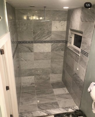 Marble Bathroom remodel - Complete bathroom remodeling using 12x24 marble, all new plumbing ran along with a linear drain, & marble threshold Marble Bathroom remodel - Complete bathroom remodeling using 12x24 marble, all new plumbing ran along with a linear drain, & marble threshold