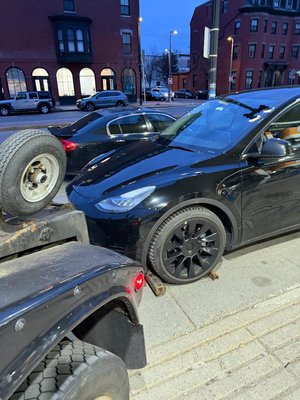 Disabled Vehicle Tow - Safe and professional transport of a Tesla Model Y by A&D Towing of Boston.  Our team carefully loaded and secured the vehicle for transport, ensuring safe handling throughout the towing process. We provide 24/7 towing and roadside assistance throughout Boston and surrounding communities.
