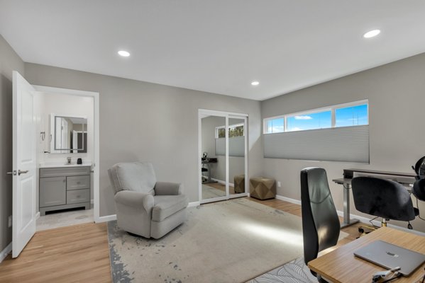 Enhancing Functionality: A Home Office and Bathroom Addition in San Jose, CA - For homeowners needing more usable space, a home office and bathroom addition offers a practical solution. In San Jose, CA, DevArt8 Builders recently completed a project that added a brand-new section to the home, designed specifically for comfort and everyday use.

The office was built from the ground up, with warm wood flooring, recessed lighting, and mirrored closet doors. It’s a quiet, dedicated space with a clean layout and natural light—ideal for working from home or managing personal projects.

Next to the office, a newly constructed bathroom includes a floating toilet, modern vanity, and a glass-enclosed shower. Finishes like an illuminated mirror and subtle tile accents keep the design simple and functional.

As an experienced home addition contractor, DevArt8 Builders focuses on building new spaces that align with the home’s layout and the homeowner’s needs. Whether it's a room addition for work, guests, or personal use, the company builds each structure with precision and long-term use in mind.

DevArt8 Builders serves San Jose, CA, and surrounding areas, providing expert construction services as a licensed general contractor specializing in home additions.

Looking to add a custom-built space to your home? Contact DevArt8 Builders to get started on your next addition.