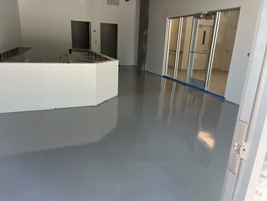 The Peak Coffee Shop - A thin mil 2-coat epoxy system consisting of a thick prime/ body coat with a urethane topcoat for enchanted durability. A product like this comes in a variety of colors the one shown here is medium grey. What color would you have picked for your floor? The Peak Coffee Shop - A thin mil 2-coat epoxy system consisting of a thick prime/ body coat with a urethane topcoat for enchanted durability. A product like this comes in a variety of colors the one shown here is medium grey. What color would you have picked for your floor?