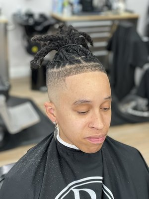 High Fade w/ Drop and Line up - My good friend and client from Oakland had come to vacation here in Vegas. Forever grateful for her appreciation and commitment to my craft and time.