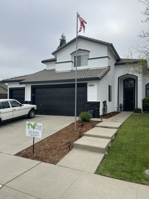 Exterior in Lincoln, CA - Rigorous pressure washing to remove powdered paint broken down from the sun. After prepping we sprayed and back rolled 2-3 coats to ensure proper coverage since the main body color was white. Then we primed and sprayed the rocks in the front and painted all the trim by hand. Absolutely gorgeous finished product. Exterior in Lincoln, CA - Rigorous pressure washing to remove powdered paint broken down from the sun. After prepping we sprayed and back rolled 2-3 coats to ensure proper coverage since the main body color was white. Then we primed and sprayed the rocks in the front and painted all the trim by hand. Absolutely gorgeous finished product.
