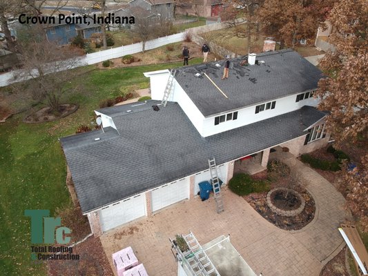 Crown Point, Indiana (Roofing & Siding Project) - This homeowner wanted a variety items accomplished: siding, roofing, gutters, and something new. So our project manager Gary decided to install accent dormers to offset the A-frame of the home. In addition, we installed the color of the year roofing shingle "Black Sable" and install a new vinyl siding system on this home. The icing on the top was the gutter system. Crown Point, Indiana (Roofing & Siding Project) - This homeowner wanted a variety items accomplished: siding, roofing, gutters, and something new. So our project manager Gary decided to install accent dormers to offset the A-frame of the home. In addition, we installed the color of the year roofing shingle "Black Sable" and install a new vinyl siding system on this home. The icing on the top was the gutter system.