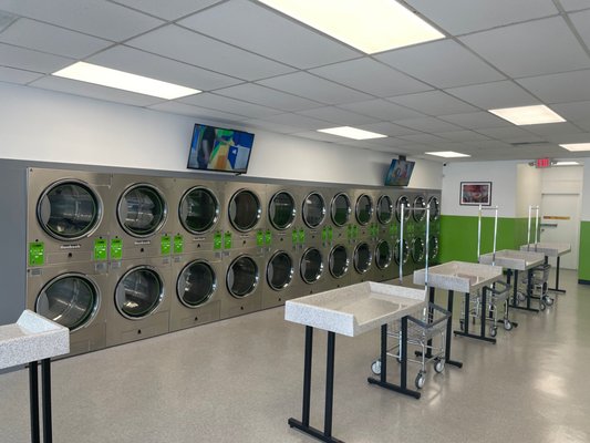 Brand New Laundromat - We opened in June 2021 and are excited to bring a brand new laundromat to Durham. We have all new, state of the art, Huebsch washers and dryers. Visit us today and let us be your go-to laundromat for all your laundry needs. We offer self-service, wash and fold drop-off service and commercial services. Attendant always on duty. Brand New Laundromat - We opened in June 2021 and are excited to bring a brand new laundromat to Durham. We have all new, state of the art, Huebsch washers and dryers. Visit us today and let us be your go-to laundromat for all your laundry needs. We offer self-service, wash and fold drop-off service and commercial services. Attendant always on duty.