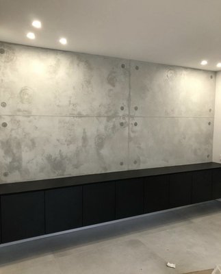 Cement Style Wall - This is a cement style wall. This wall closely resembles the look of cement but is actually texturized paint. Our client wanted to add a modern touch to their home. Texturized paint elevates any space and adds the perfect touch. We specialize in various kinds of texturized paint applications. Cement Style Wall - This is a cement style wall. This wall closely resembles the look of cement but is actually texturized paint. Our client wanted to add a modern touch to their home. Texturized paint elevates any space and adds the perfect touch. We specialize in various kinds of texturized paint applications.