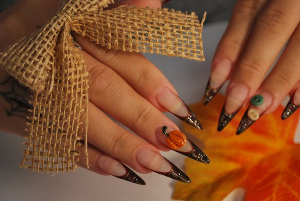 Nail Designs - These nail jobs showcase a variety of creative ideas our clients have brought to us, each one personalized and brought to life by our skilled nail artists. From elegant and understated designs to bold, eye-catching creations, we love turning every client’s inspiration into a beautiful, lasting look that reflects their style and personality. Whether you come with a picture, a theme, or just a vibe, we’ll transform your ideas into nails you’ll be proud to show off. Nail Designs - These nail jobs showcase a variety of creative ideas our clients have brought to us, each one personalized and brought to life by our skilled nail artists. From elegant and understated designs to bold, eye-catching creations, we love turning every client’s inspiration into a beautiful, lasting look that reflects their style and personality. Whether you come with a picture, a theme, or just a vibe, we’ll transform your ideas into nails you’ll be proud to show off.