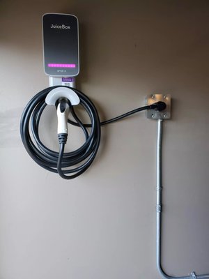 EV Charging Installation - Installing an EV (electric vehicle) charger in a garage involves several specific steps to ensure both functionality and safety.
1. Electrical System Check: Inspect the existing electrical panel to confirm it can support the additional load of the EV charger. You might need a panel upgrade or a new dedicated circuit for the charger.
2. Choose the Charger: Electrical System Check: Inspect the existing electrical panel to confirm it can support the additional load of the EV charger. You might need a panel upgrade or a new dedicated circuit for the charger.
and Last: Configuration: Set up the charger according to the manufacturer’s instructions. This may involve configuring settings such as charging speed, scheduling, and connectivity features.
Testing: Test the charger to ensure it operates correctly. Verify that it communicates with the vehicle and charges it efficiently.
Call us now for your next install! EV Charging Installation - Installing an EV (electric vehicle) charger in a garage involves several specific steps to ensure both functionality and safety.
1. Electrical System Check: Inspect the existing electrical panel to confirm it can support the additional load of the EV charger. You might need a panel upgrade or a new dedicated circuit for the charger.
2. Choose the Charger: Electrical System Check: Inspect the existing electrical panel to confirm it can support the additional load of the EV charger. You might need a panel upgrade or a new dedicated circuit for the charger.
and Last: Configuration: Set up the charger according to the manufacturer’s instructions. This may involve configuring settings such as charging speed, scheduling, and connectivity features.
Testing: Test the charger to ensure it operates correctly. Verify that it communicates with the vehicle and charges it efficiently.
Call us now for your next install!