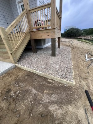 Rock Border Nags Head - This project involved installation of a 3 foot wide rock border, 6 inches deep around the perimeter of this new construction home in Nags Head. Rock Border Nags Head - This project involved installation of a 3 foot wide rock border, 6 inches deep around the perimeter of this new construction home in Nags Head.