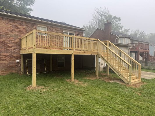 Before and after of a treated deck - We were able to transform our clients outdoor space from a worn out and unsafe deck, to a new and bigger deck. This was done with treated lumber. We handled everything from demolition to rebuild. Done in Lexington, KY.