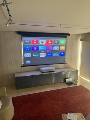 15 Year old TV update - The Client wanted to upgrade his existing TV, once on site and with some time we decided to modify the existing cabinet in a way that allowed the client to see out his window while more than doubling his screen size at the same time.