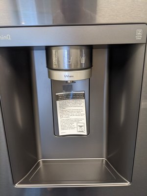Black Stainless Steel Refrigerator with Happy Hour Ice Balls - Black steel side by side with dual ice makers.  The craft ice makes round balls that are perfect for happy hour cocktails.  The refrigerator has 27 cu ft of storage, cooling doors for really fresh foods, simple display to control functions, in door ice and water access.
