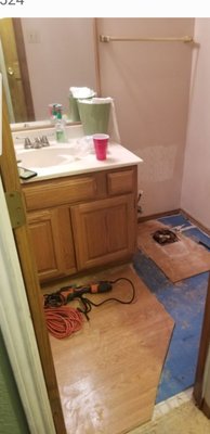 Half bath update - We gutted the entire bathroom, drywall/tabe/bed/texture. Installed new light fixture, vanity, mirror, sink, toilet and new flooring that matches the rest of the house with new baseboards