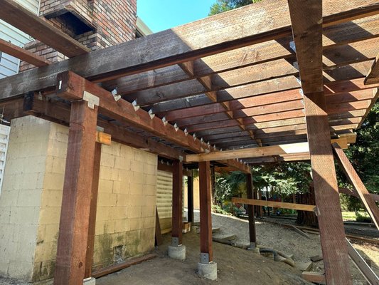 Deck Replacement 2026 - We built two custom elevated decks in Rocklin featuring Trex composite decking, aluminum railings, and matching privacy walls. The project included new framing, concrete footings, and stairs, creating two distinct outdoor spaces with a coordinated finish.