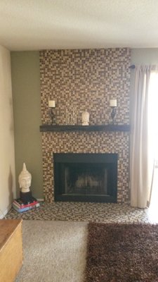 Fireplace Remodel - Nothing worse than drywall bumps as we used to call them back in the 80's. Simple fireplace remodel changing out from tired and drab to current and elegant.