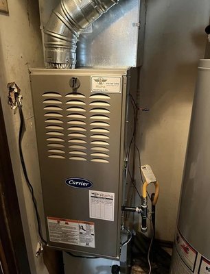 Furnace Replacement - Geoff replaced a furnace for a customer with Carrier brand, new filter rack, thermostat, duct modifications, and gas line connections.