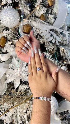 Silver Chrome Winter Nail Set - This silver chrome stiletto nail set features a sleek, high-shine finish with fine shimmer for an icy winter look. Designed to elongate the hands and make a statement, this custom set is perfect for the holiday season, special occasions, or glam everyday wear. Silver Chrome Winter Nail Set - This silver chrome stiletto nail set features a sleek, high-shine finish with fine shimmer for an icy winter look. Designed to elongate the hands and make a statement, this custom set is perfect for the holiday season, special occasions, or glam everyday wear.