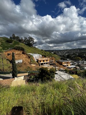 Custom Home Construction - We loved bringing this hillside new build to life. What started as a challenging hillside construction site has been transformed into a beautiful modern home designed to take full advantage of the views. From the structure and retaining walls to the exterior finishes, outdoor living areas, and landscaping, every phase was carefully planned and built with the finished home in mind.