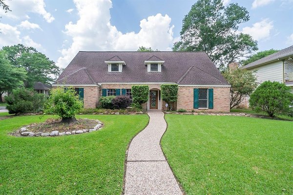 SOLD - 730 Marne Lane, Houston, Texas 77090 - This Houston two-story corner home offers a patio, and a two-car garage.