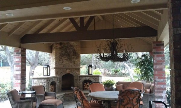 Design Build Outdoor Living Space in San Antonio, TX - Design Build Outdoor Living with Patio Cover, Kitchen, Fireplace, Full Media, Shed & fence in Inwood Estates San Antonio, TX.