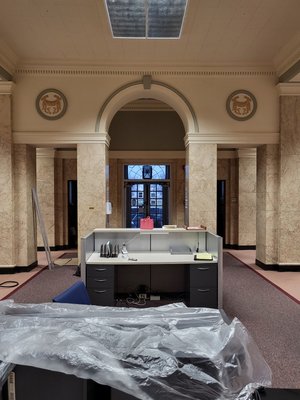 Vintage Purse Museum Lobby Remodel 2024 - This Lobby Remodel is being done in the Old Diversitec building of Manteno, Now the "Vintage Purse Museum." We repaired the damaged plaster dental crown and other areas, then repainted the repair areas. Afterward, we repainted the accent color in the entire room.  The customer is very pleased with her Lobby/Show Room now and is scheduled to open in June 2024.