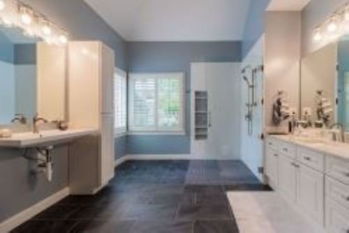 Bathroom Conversion - The pictures shown below are of a bathroom conversion done for a client that had a separate tub & shower, but they could no longer use the tub, and the shower was too small for the walker that was being used. We took out the tub & shower, and replaced it with a "wet room", allowing them to have much more space with an open shower easily accommodating the walker, plus providing a more than adequate space if in the future a wheelchair might be needed. Bathroom Conversion - The pictures shown below are of a bathroom conversion done for a client that had a separate tub & shower, but they could no longer use the tub, and the shower was too small for the walker that was being used. We took out the tub & shower, and replaced it with a "wet room", allowing them to have much more space with an open shower easily accommodating the walker, plus providing a more than adequate space if in the future a wheelchair might be needed.