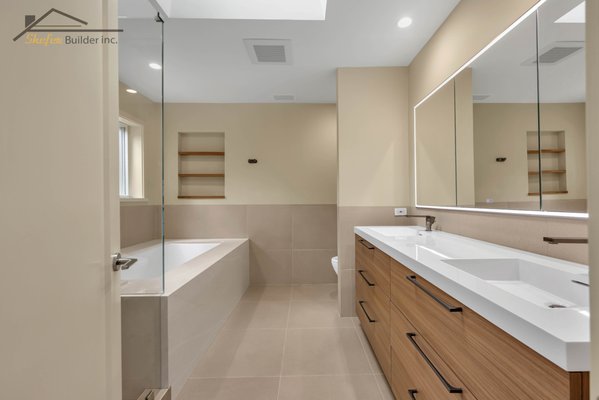 Bathroom Remodel in San Mateo, Ca - Transforming a primary bathroom from outdated to a modern, warm, and functional retreat. This San Mateo renovation features a spacious walk-in shower, soaking tub, custom wood vanity, clean tile finishes, and thoughtful lighting. At Shefer Builder, we focus on smart layouts, quality craftsmanship, and details that make every space feel special.