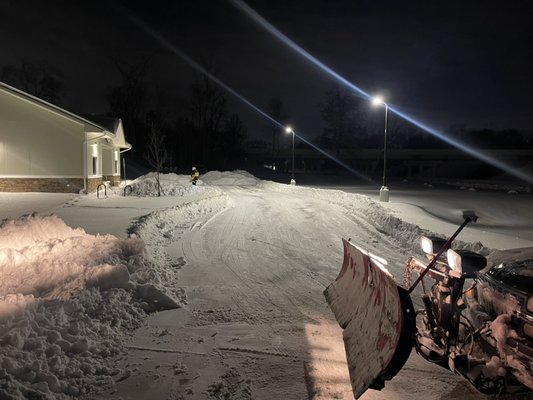commercial snow removal - this was a commercial client that we service during snow storms they were happy to get there a lot plowed, especially with 12 inches of snow on the ground so that they can open up and stay functional even after that massive storm