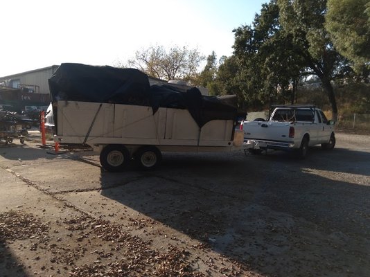 Heauser Hauling self buit transforming flatbed tilt deck trailer with hydrolics dump and removable stake sides. - 17 cubic yard dump trailer to get the job done. then in the matter of minutes our 17 cubic yard dump trailer quickly transforms into a flatbed tilt deck (15' x 8' with GVWR <10,000 lbs). With our additional loading ramps attached it makes loading and transporting your small equipment a breeze when you need it transported to your next remote work site location. Heauser Hauling self buit transforming flatbed tilt deck trailer with hydrolics dump and removable stake sides. - 17 cubic yard dump trailer to get the job done. then in the matter of minutes our 17 cubic yard dump trailer quickly transforms into a flatbed tilt deck (15' x 8' with GVWR <10,000 lbs). With our additional loading ramps attached it makes loading and transporting your small equipment a breeze when you need it transported to your next remote work site location.