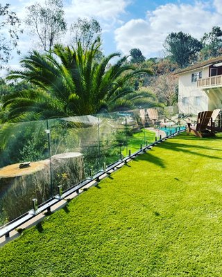 Glass guardrail - Sleek glass guardrail:  safety meets style in this modern upgrade. Transparent protection with an unobstructed view
This project consisted of 3/8 tempered glass custom cut