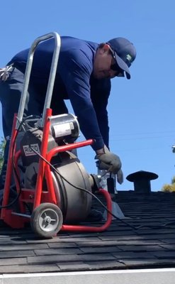 Drain Cleaning - Ran snake through Roof vent, to clear drain. Drain Cleaning - Ran snake through Roof vent, to clear drain.
