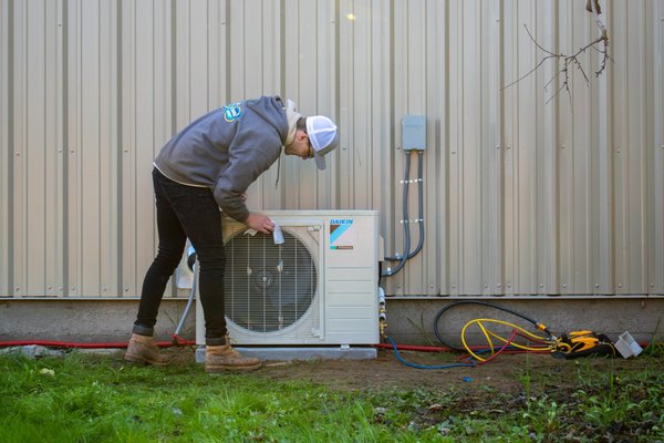 Annual Maintenance - Our technician, Jason, is performing maintenance on an installed mini-split unit, thoroughly cleaning any dust and residue to ensure optimal performance!