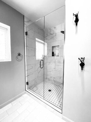 Frameless Showers - We specialize in frameless glass showers. There are many styles and glass types available, and we work with our clients and partners to design each custom shower. We work with residential, remodelers, and builders, so if you need a new shower then send us a message with pictures and rough sizes and we can send you a quick estimate. Whether you need to rip out and replace an old shower, or you have a new custom build, we'll work with you to provide quality work in a timely manner. Frameless Showers - We specialize in frameless glass showers. There are many styles and glass types available, and we work with our clients and partners to design each custom shower. We work with residential, remodelers, and builders, so if you need a new shower then send us a message with pictures and rough sizes and we can send you a quick estimate. Whether you need to rip out and replace an old shower, or you have a new custom build, we'll work with you to provide quality work in a timely manner.