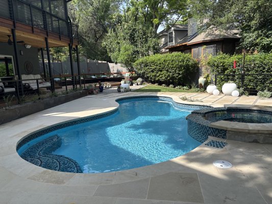 Pool Patio Update - This client approached us about updating their entire back and front yard with the main update happening about the pool patio. New stone patio with gravel, steel retaining walls, and plantings. Pool Patio Update - This client approached us about updating their entire back and front yard with the main update happening about the pool patio. New stone patio with gravel, steel retaining walls, and plantings.