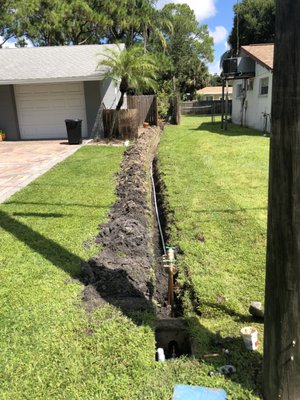 Waterline - We installed a new water line from the meter to the house along with a new backflow.