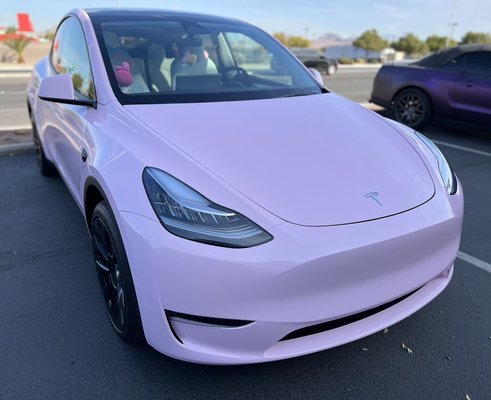 Custom color change wrap Tesla Model Y - Tesla Model Y wrapped in My Melody Japanese character-inspired pink. This specific type of pink was printed in-house. Custom color change wrap Tesla Model Y - Tesla Model Y wrapped in My Melody Japanese character-inspired pink. This specific type of pink was printed in-house.